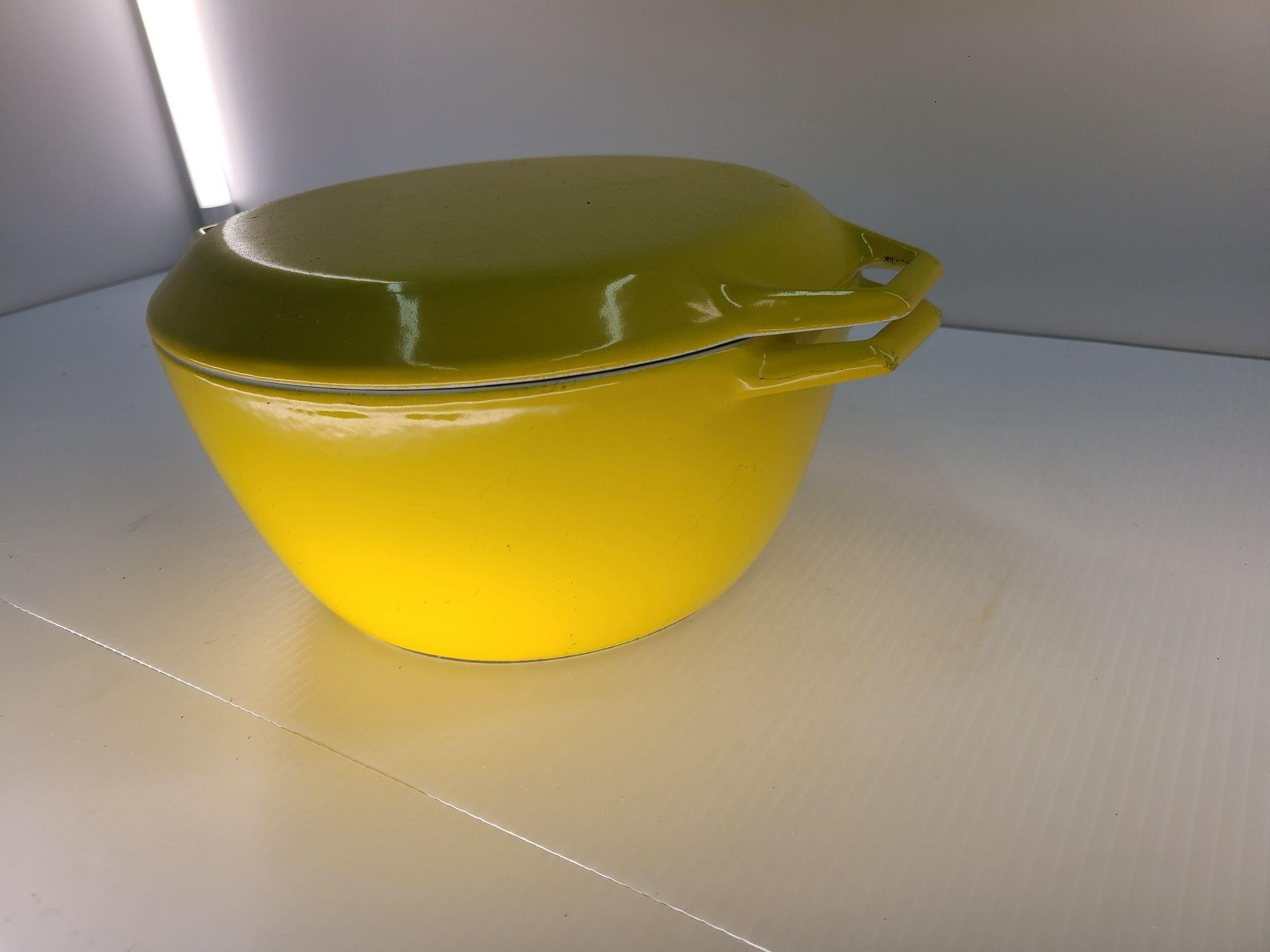 Yellow enameled cast iron pot