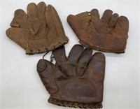 3 leather baseball gloves