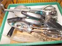 Several Kitchen Utensils, Hand Mixers, Metal Rack