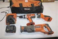 Ridgid Cordless Drill, Light, And Saw With (2)