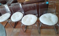 J - LOT OF 4 PLASTIC CHAIRS