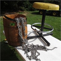 Nail keg with tire chains, stool