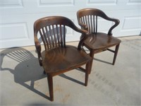 2 Matching Wooden armchairs - solid