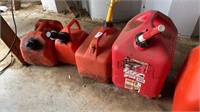 Four gas cans (empty)