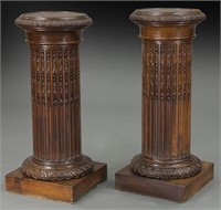 Pr. carved wood fluted pedestals,