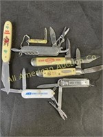 7 vintage promo knives, various