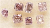 Seven loose pink diamonds