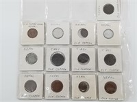 13 Coins from Quebec and Nepal, mostly copper, ear