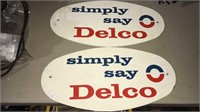 Pair of vintage Delco store signs on metal simply