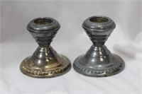 A Pair of Weighted Sterling Candlesticks