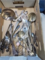 Flat of silver plate flatware and serving pieces