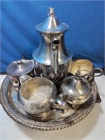Silver plate tray with a coffee pot creamer s