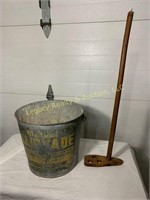 galvanized bukcet and wooden tool