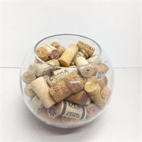 Etched glass bowl full of wine corks