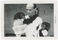 5x3.5" August 1959 Man with two monkeys