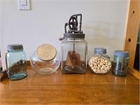 Antique butter churn, jars, and cookie jar