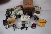 (8) FISHING REELS IN BOXES: