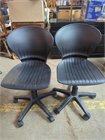 Two Black Ribbed Plastic Swivel Chairs, Great