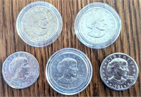 Five uncirculated Susan B Anthony Dollar coins.