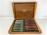 8 vintage Cutco steak knives in wooden
