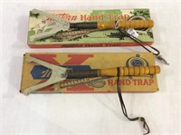 Lot of 2 Hand Trap Western Throwers w/ Original