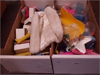 Two containers of Barbie and family accessories