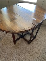 Vintage drop leaf table. Approximately
