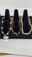 Group of (3) heart themed Sterling g bracelets