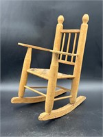 Doll sized rocker.  Rocking chair