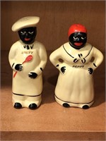 VINTAGE SALTY AND PEPPY SHAKERS. SALTY HAS A
