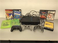 PS2 w/games, controllers and power cord, tested
