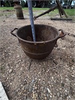 antique cast-iron crock with handles