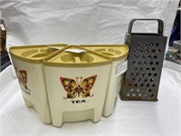 3 Plastic Canisters & Metal Grater