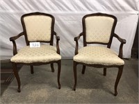UPHOLSTERED ARM CHAIRS
