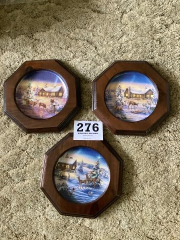 Three wall hanging Christmas/winter plates with
