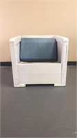 Wooden seat with blue cushion