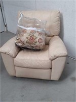 Leather recliner and swivels  with two throw