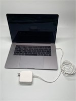 Apple MacBook Pro Model A1707 (Powers On, Wiped)