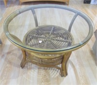 Wicker round top coffee table. Measures: 30"