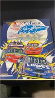 Autographed Sam Bass book - the NASCAR Art of Sam