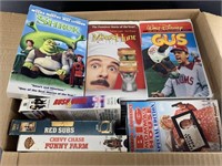 Box of VHS many are Disney