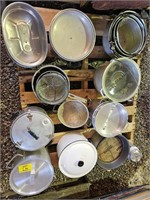 pallet of metal pots and pans