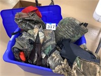 Tote of hunting clothes and supplies