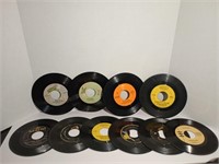 55 mixed genre 45s in various conditions.