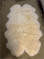 Real sheepskin rug 73” x 47”