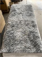 FLUFFY GREY AND WHITE AREA RUG 64IN X 48IN