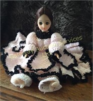 Pink and black knitted Dress 
Doll sits, eyes