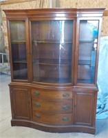 China hutch with curved glass.