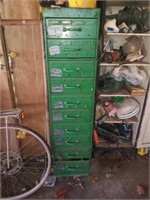Green metal cabinet about 5ft tall.  Full of