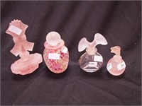 Four perfume bottles: three with frosted